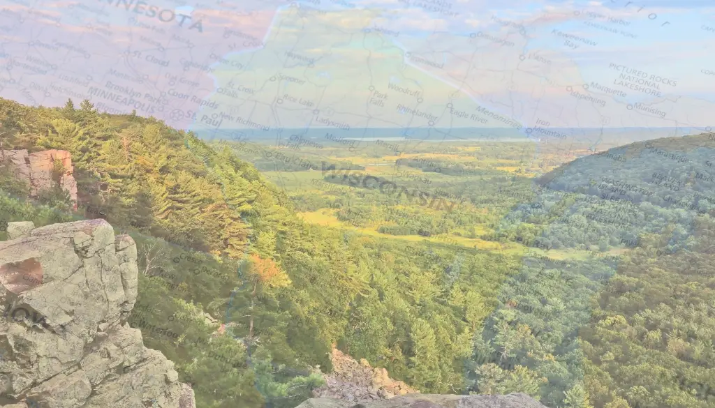 Map of Wisconsin underneath a landscape of trees and bluffs.|Electronics in a recycling bin in front of a map of the state of Wisconsin.